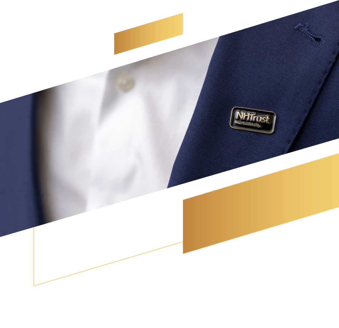 Close-up of a person in a blue suit wearing an NHTrust pin on the lapel, with gold graphic accents—reflecting professionalism in banking and insurance.